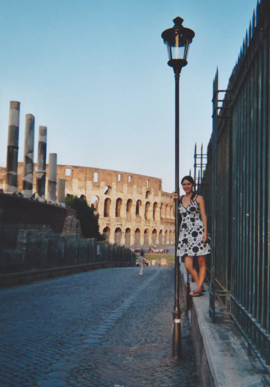 Natalie in Rome, on the road beside the Colosseum